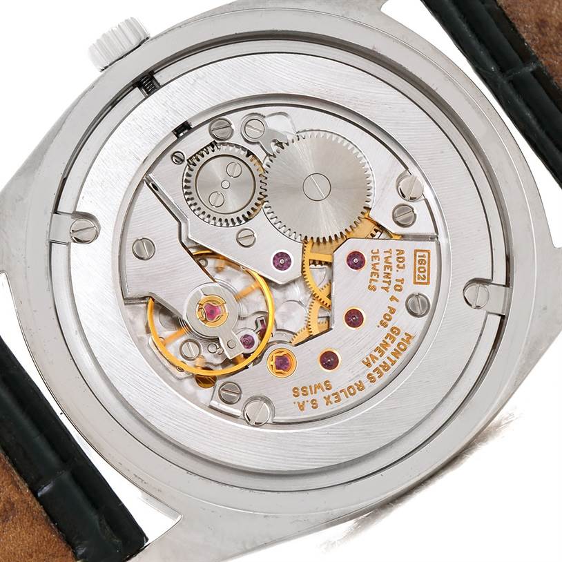 This image shows the backside of a Rolex Cellini 4233 Men's White Gold Black Dial 4233 Men's White Gold Black Dial watch, highlighting its detailed movement and internal mechanics.