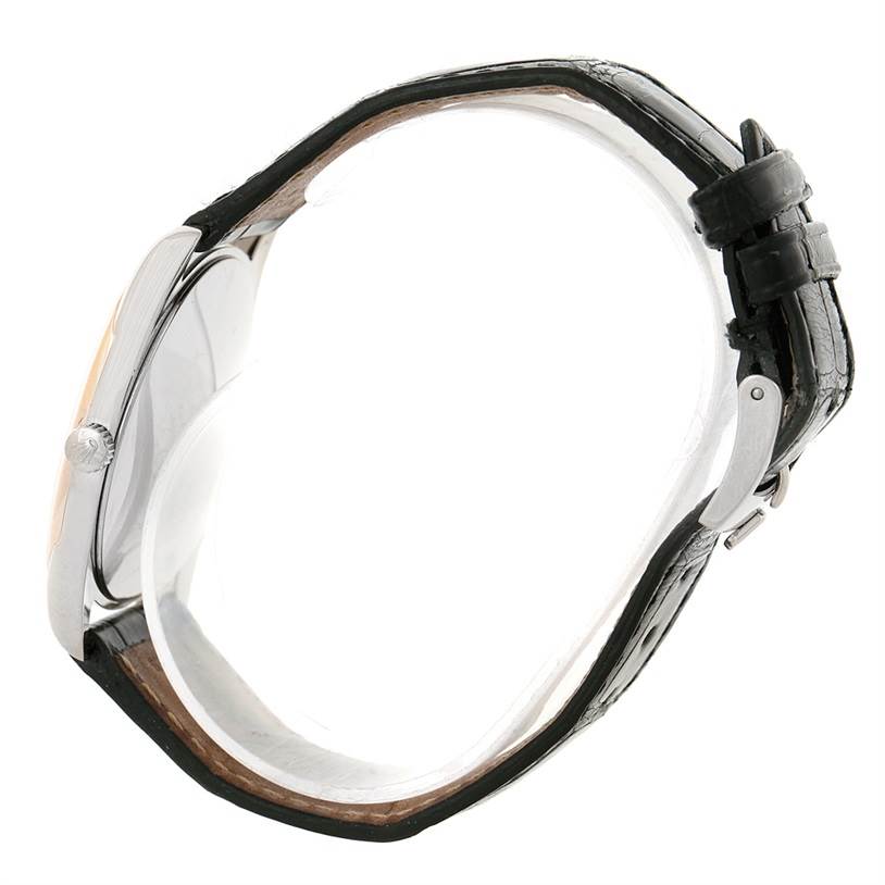 The image shows a side view of the Rolex Cellini 4233 Men's White Gold Black Dial 4233 Men's White Gold Black Dial watch, highlighting its case, crown, and leather strap.