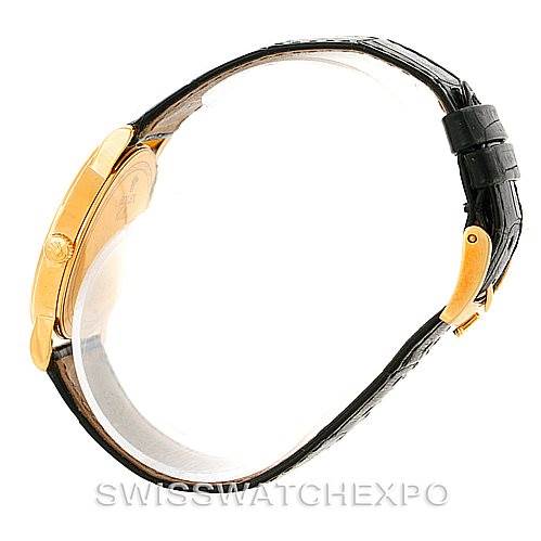 This image shows a side view of the Rolex Cellini 5115 Men
s Yellow Gold Champagne Dial 5115 Men
s Yellow Gold Champagne Dial watch, highlighting its case and leather strap.