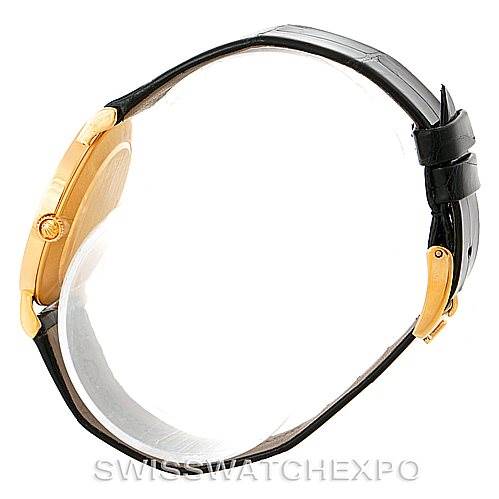 Side view of the Rolex Cellini 5112 Men's Yellow Gold White Dial 5112 Men's Yellow Gold White Dial watch, showcasing its gold case, crown, and black leather strap.