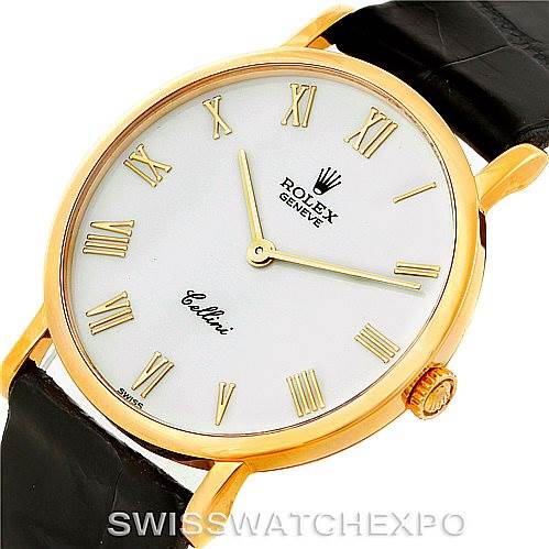 The image shows a Rolex Cellini 5112 Men's Yellow Gold White Dial 5112 Men's Yellow Gold White Dial watch from an angled perspective, highlighting the face, Roman numeral markers, gold case, and leather strap.