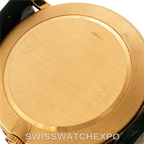 This image shows the back case of a Rolex Cellini 5112 Men's Yellow Gold White Dial 5112 Men's Yellow Gold White Dial watch, highlighting its gold material and engraved details.
