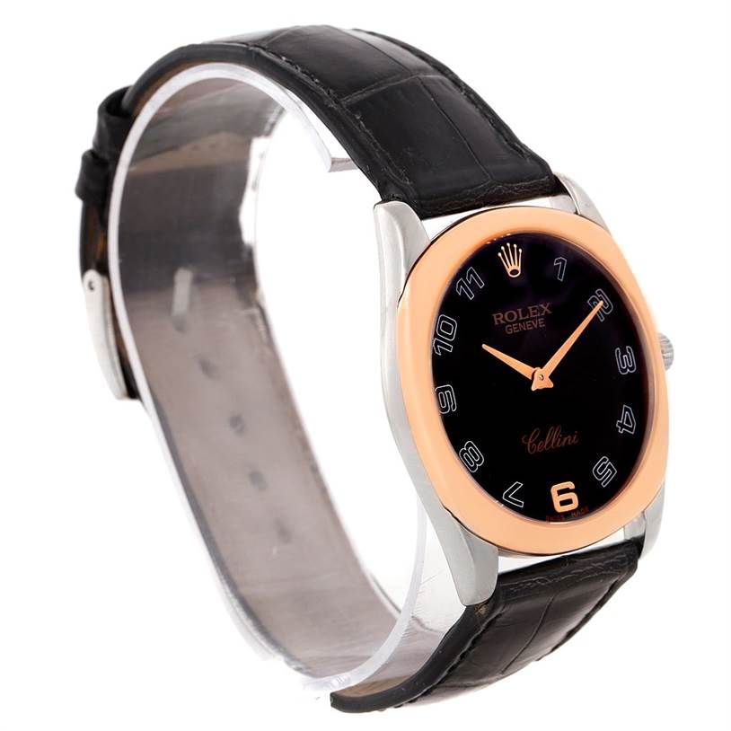 The image shows a Rolex Cellini 4233 Men's White Gold Black Dial 4233 Men's White Gold Black Dial watch with a black leather strap, rose gold bezel, and black dial, angled to the right.