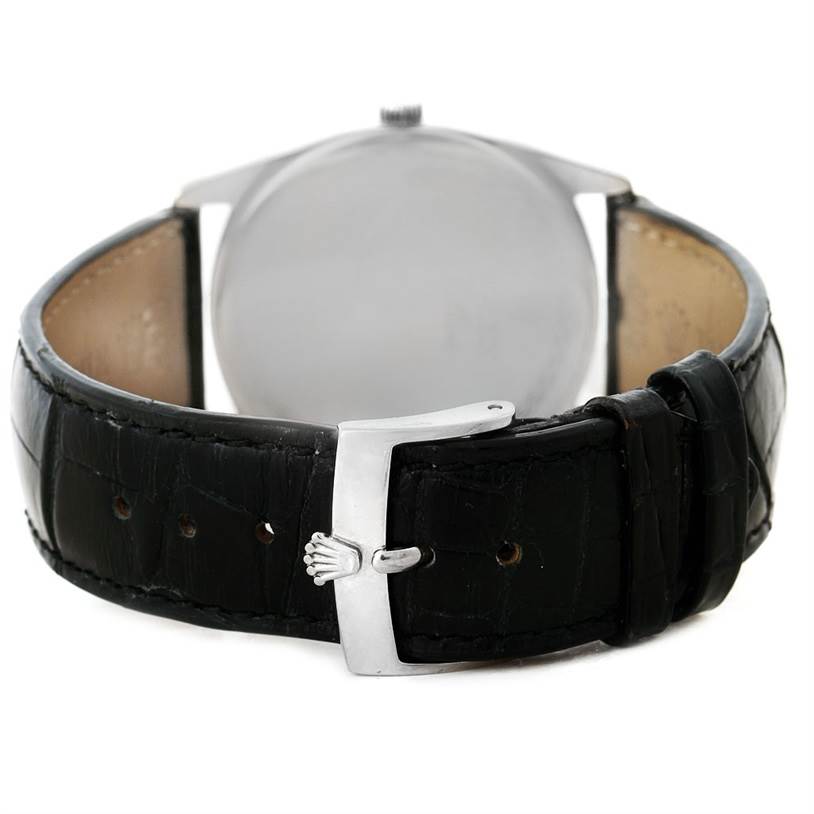 This image shows the rear angle of a Rolex Cellini 4233 Men's White Gold Black Dial 4233 Men's White Gold Black Dial watch, highlighting the black leather strap and silver buckle.