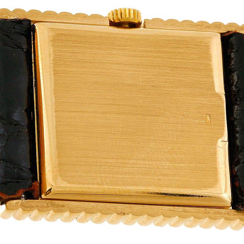 This image shows the back case and crown of a Rolex Cellini 4012 Men's Yellow Gold Black Dial 4012 Men's Yellow Gold Black Dial watch from a close-up angle.