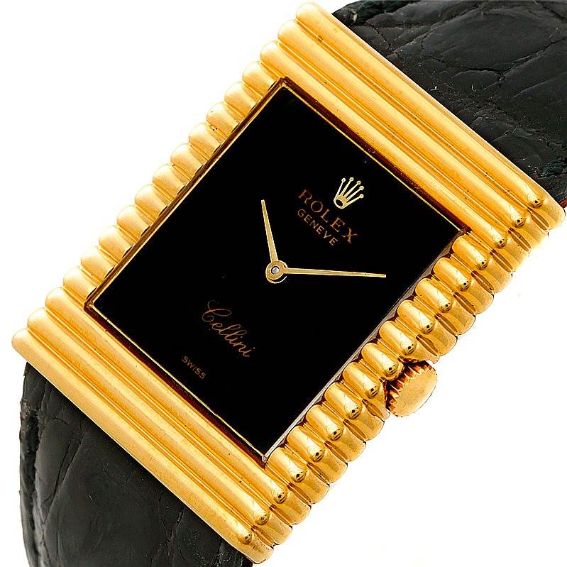 The image shows a Rolex Cellini 4012 Men's Yellow Gold Black Dial 4012 Men's Yellow Gold Black Dial watch from a top-down angle, highlighting its black dial, gold case, and black leather strap.