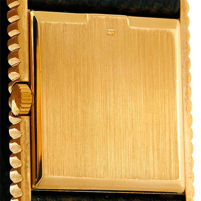 This image shows a close-up of the gold clasp and edge of the Rolex Cellini 4012 Men's Yellow Gold Blue Dial 4012 Men's Yellow Gold Blue Dial watch.