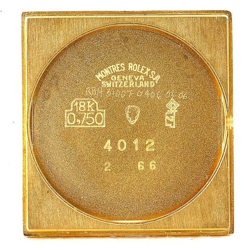 The image shows the back casing of a Rolex Cellini 4012 Men's Yellow Gold Blue Dial 4012 Men's Yellow Gold Blue Dial watch, displaying the model number 4012 and hallmarks.