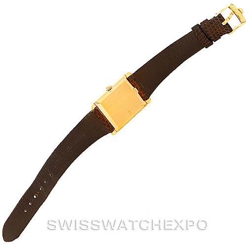 The image shows a Rolex Cellini 4105 Men's Yellow Gold Silver Dial 4105 Men's Yellow Gold Silver Dial watch from an overhead angle, highlighting the leather strap and gold rectangular case.