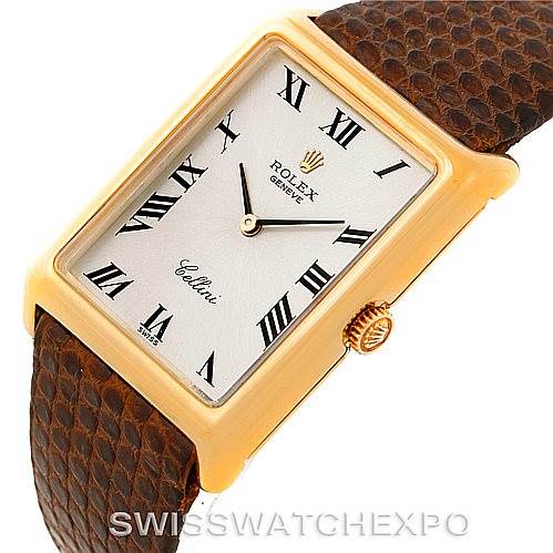 The image shows a Rolex Cellini 4105 Men's Yellow Gold Silver Dial 4105 Men's Yellow Gold Silver Dial watch at a slight angle, highlighting its rectangular dial, Roman numerals, and brown leather strap.