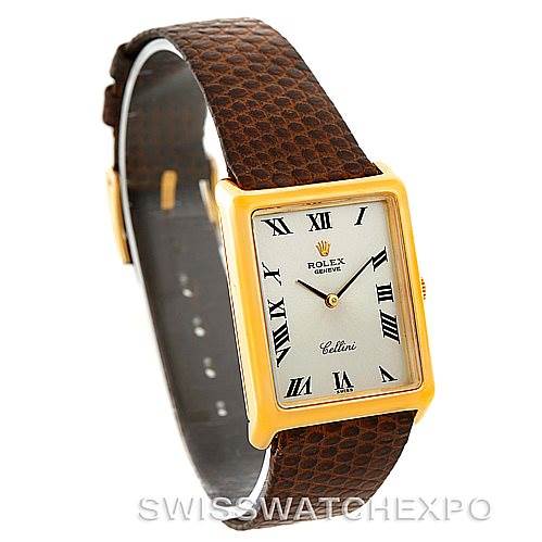 The image shows a Rolex Cellini 4105 Men's Yellow Gold Silver Dial 4105 Men's Yellow Gold Silver Dial watch angled from the front-left, highlighting its rectangular dial and brown leather strap.
