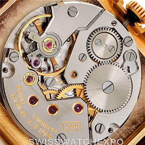 The image shows an inside view of the mechanical movement of a Rolex Cellini 4105 Men's Yellow Gold Silver Dial 4105 Men's Yellow Gold Silver Dial watch.