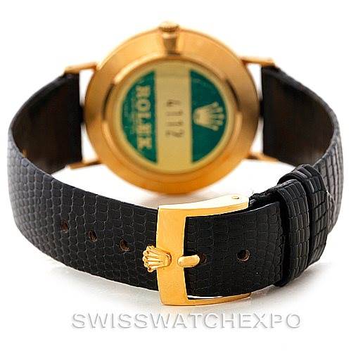 The image shows the back of a Rolex Cellini 4112 Men's Yellow Gold Silver Dial 4112 Men's Yellow Gold Silver Dial watch, focusing on the clasp and strap.