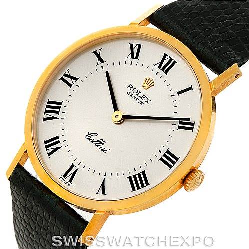 The image shows the face and black strap of a Rolex Cellini 4112 Men's Yellow Gold Silver Dial 4112 Men's Yellow Gold Silver Dial watch at a slight angle.