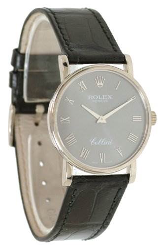 The image shows a Rolex Cellini 5115/9 Men
s White Gold Grey Dial 5115/9 Men
s White Gold Grey Dial watch at an angle, displaying the face, bezel, crown, and leather strap.