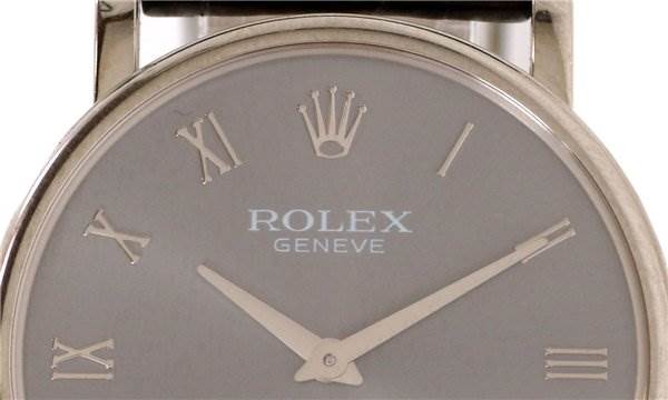 The image shows a close-up of the dial and hands of a Rolex Cellini 5115/9 Men
s White Gold Grey Dial 5115/9 Men
s White Gold Grey Dial watch.