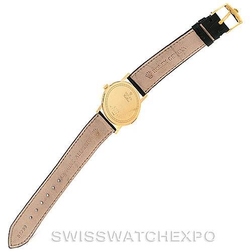 The image shows the back view of a Rolex Cellini 5115 Men's Yellow Gold Beige Dial 5115 Men's Yellow Gold Beige Dial model watch, displaying the case back and full leather strap, with the buckle visible.