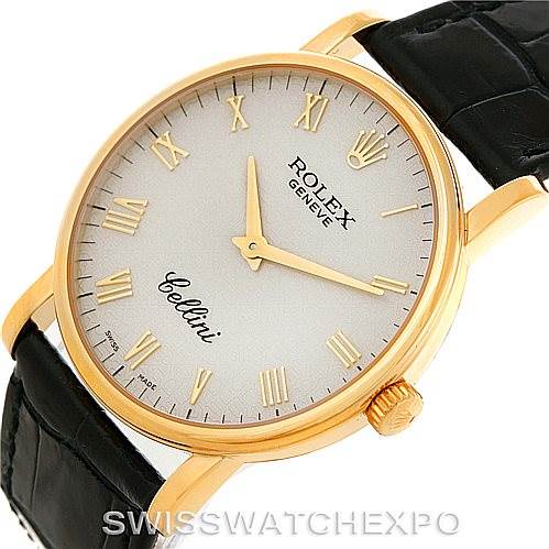 This image shows a Rolex Cellini 5115 Men's Yellow Gold Beige Dial 5115 Men's Yellow Gold Beige Dial watch at an oblique angle, displaying the face, crown, and part of the strap.