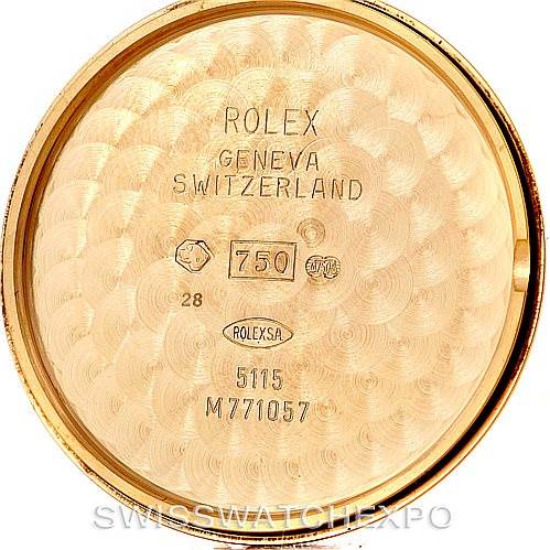 This image shows the inside case back of a Rolex Cellini 5115 Men's Yellow Gold Beige Dial 5115 Men's Yellow Gold Beige Dial model watch, displaying various engravings and hallmarks.