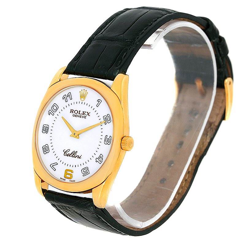 This image displays a Rolex Cellini 4233 Men's Yellow Gold White Dial 4233 Men's Yellow Gold White Dial watch at an oblique angle, showcasing its gold case, white dial, black leather strap, and crown.