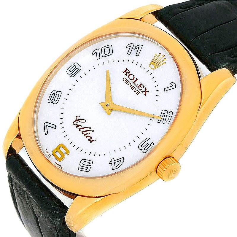 This image shows a close-up view of the Rolex Cellini 4233 Men's Yellow Gold White Dial 4233 Men's Yellow Gold White Dial watch, highlighting the dial, hands, and part of the strap.