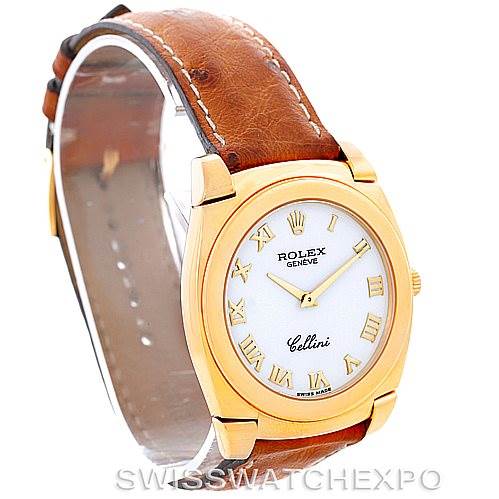 This image shows a Rolex Cellini 5330 Men's Yellow Gold White Dial 5330 Men's Yellow Gold White Dial watch at a slight angle, highlighting its gold case, white dial, Roman numerals, and brown leather strap.