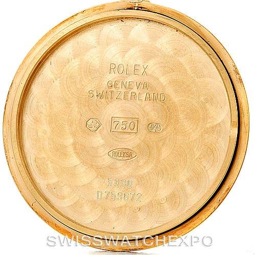 This image shows the inner case back of a Rolex Cellini 5330 Men's Yellow Gold White Dial 5330 Men's Yellow Gold White Dial watch, featuring engravings and hallmarks.