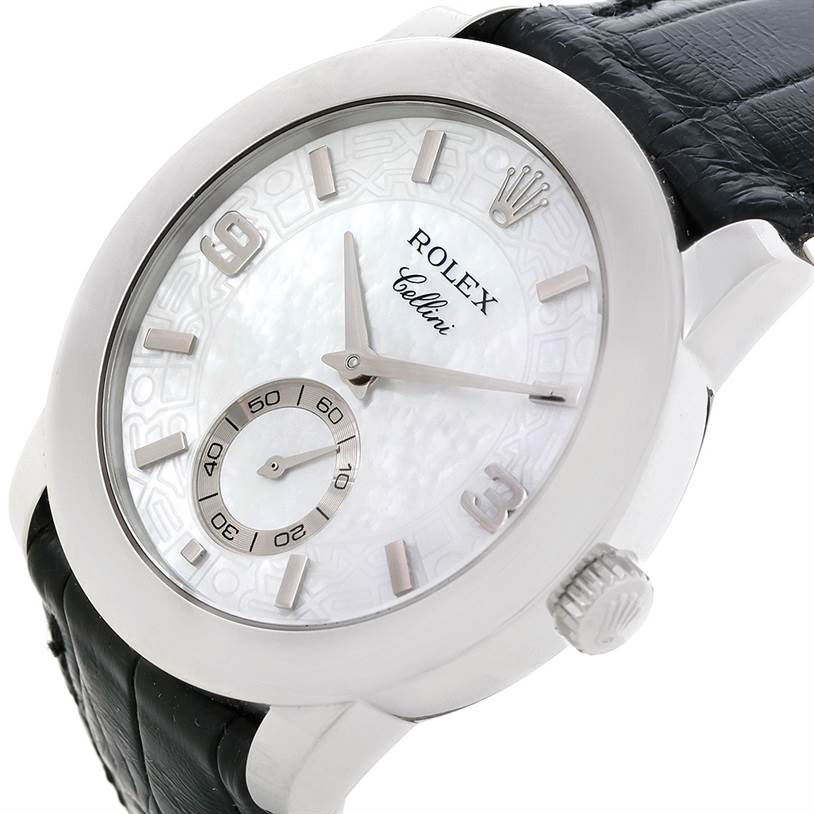 The image shows a close-up view of the Rolex Cellini 5240 Men's Platinum Mother of Pearl Dial 5240 Men's Platinum Mother of Pearl Dial watch dial and part of its black leather strap.