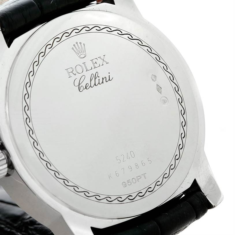 This image shows the back case of the Rolex Cellini 5240 Men's Platinum Mother of Pearl Dial 5240 Men's Platinum Mother of Pearl Dial watch, featuring engraved branding and serial numbers.