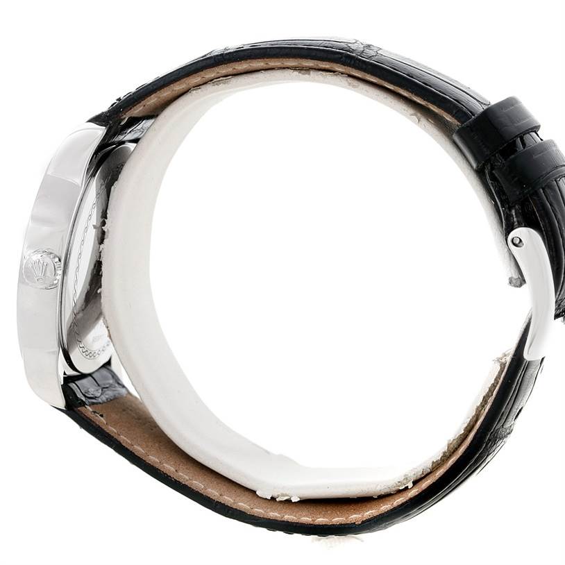 The image shows a side view of the Rolex Cellini 5240 Men's Platinum Mother of Pearl Dial 5240 Men's Platinum Mother of Pearl Dial watch, highlighting its case, crown, and black leather strap.