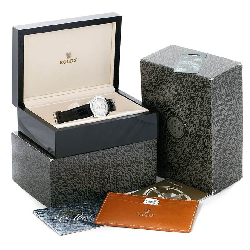 This image shows a Rolex Cellini 5240 Men's Platinum Mother of Pearl Dial 5240 Men's Platinum Mother of Pearl Dial watch in its box, along with outer packaging and accompanying documents.