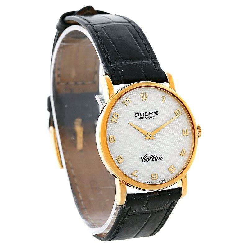 This image shows a Rolex Cellini 5115 Men's Yellow Gold Mother of Pearl Dial 5115 Men's Yellow Gold Mother of Pearl Dial watch at a slight side angle, highlighting its face, gold case, and black leather strap.