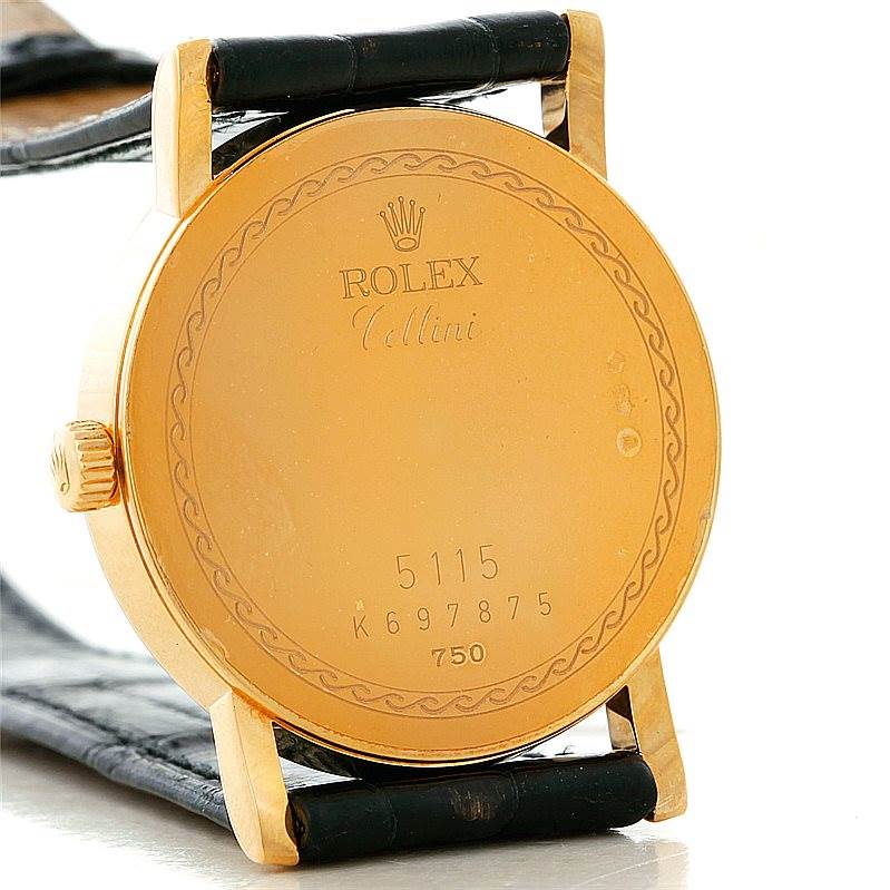 The image shows the back case of a Rolex Cellini 5115 Men's Yellow Gold Mother of Pearl Dial 5115 Men's Yellow Gold Mother of Pearl Dial watch, including the engraved model details and crown.