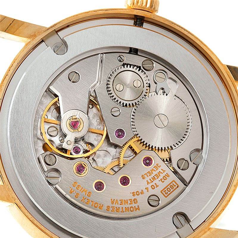 The image shows the intricate movement mechanism of the Rolex Cellini 5115 Men's Yellow Gold Mother of Pearl Dial 5115 Men's Yellow Gold Mother of Pearl Dial watch, viewed from the back.