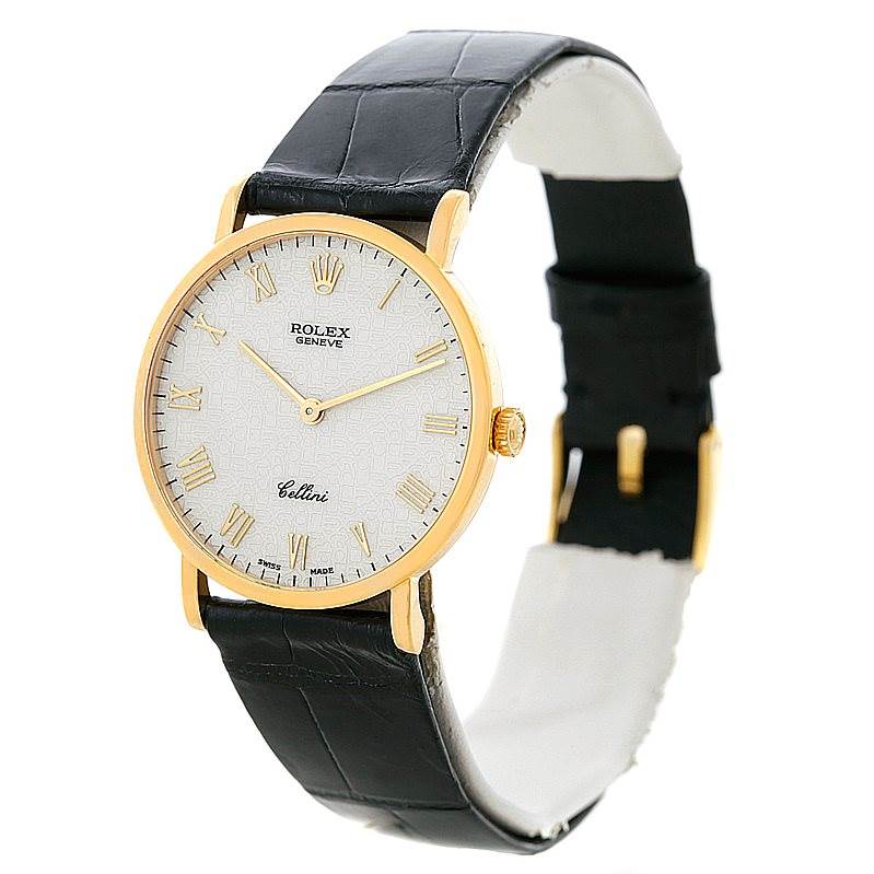 This image shows a Rolex Cellini 5112 Men's Yellow Gold Beige Dial 5112 Men's Yellow Gold Beige Dial watch at a slight angle, highlighting the face, hands, crown, and black leather strap.