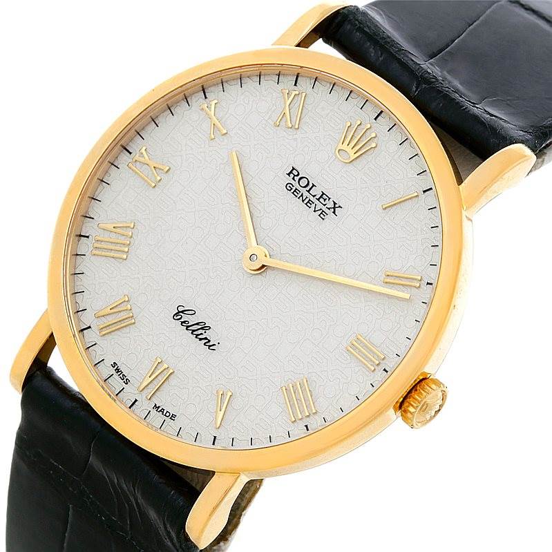 This image shows a front angle of the Rolex Cellini 5112 Men's Yellow Gold Beige Dial 5112 Men's Yellow Gold Beige Dial watch, highlighting its dial, Roman numerals, and leather strap.