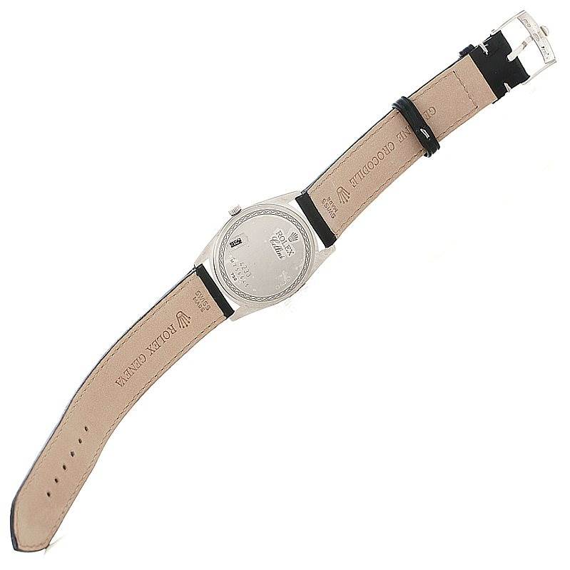 The image shows the back view of the Rolex Cellini 4233 Men's White Gold Black Dial 4233 Men's White Gold Black Dial watch, including the case back, crown, and leather strap with its inner lining.