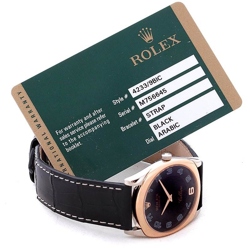 The image shows a Rolex Cellini 4233 Men's White Gold Black Dial 4233 Men's White Gold Black Dial watch with a black leather strap and a warranty card angled above it.