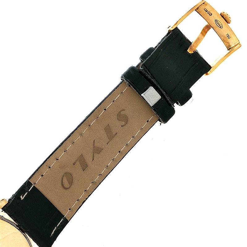 This image shows an angled view displaying the leather strap and gold buckle of a Rolex Cellini 5116 Men's Yellow Gold Silver Dial 5116 Men's Yellow Gold Silver Dial watch.