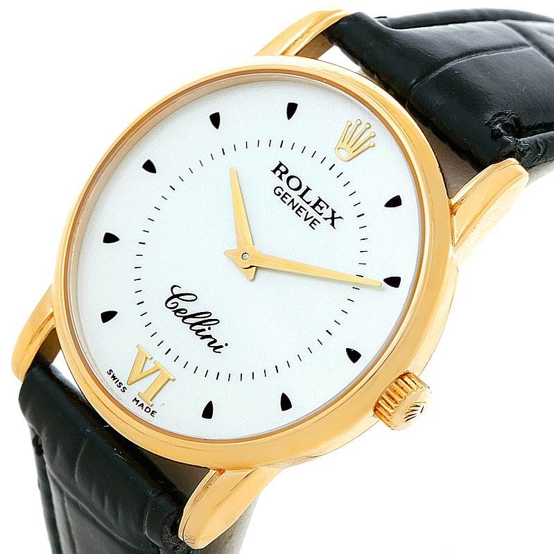 The image shows a close-up view of the face and crown of a Rolex Cellini 5116 Men's Yellow Gold Silver Dial 5116 Men's Yellow Gold Silver Dial model with a black leather strap.