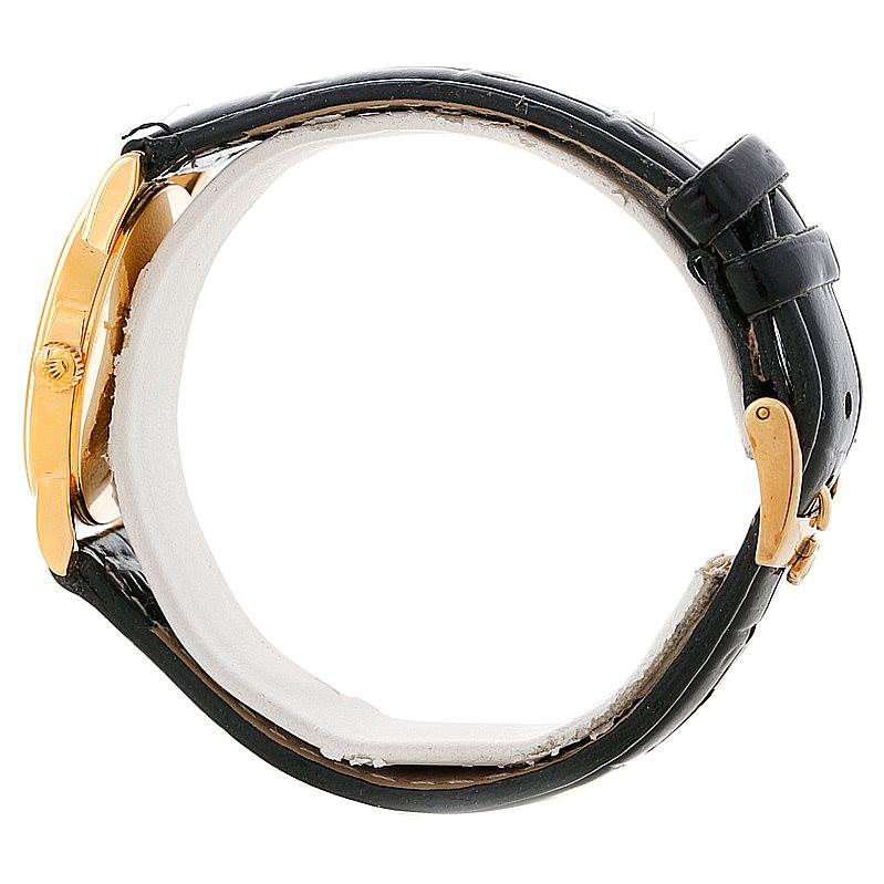 The image shows a side profile of the Rolex Cellini 5116 Men's Yellow Gold Silver Dial 5116 Men's Yellow Gold Silver Dial watch, highlighting the crown, case, and black leather strap with buckle.