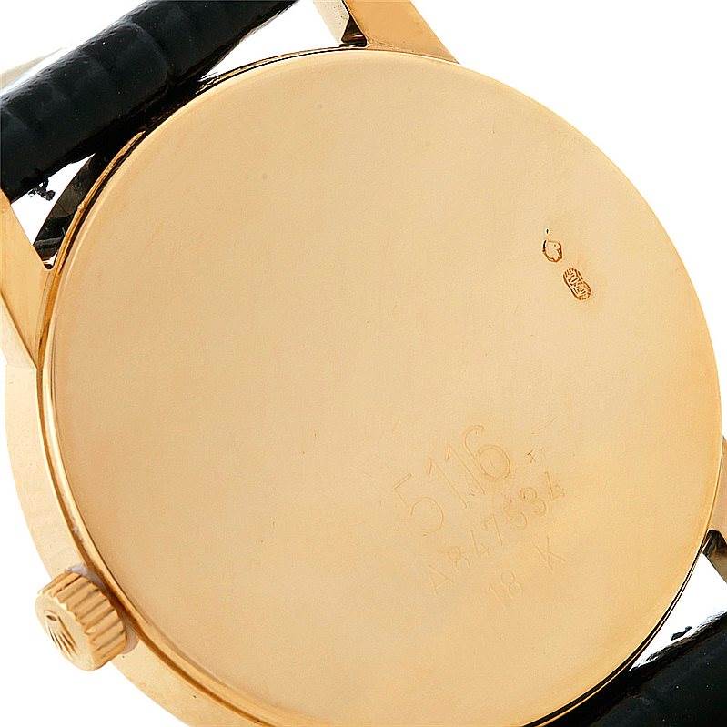 The image shows the back case, strap, and crown of a Rolex Cellini 5116 Men's Yellow Gold Silver Dial 5116 Men's Yellow Gold Silver Dial watch, with engravings visible on the back case.