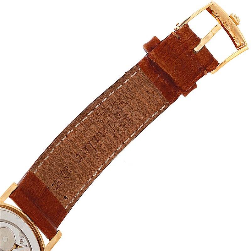 The image shows the brown leather strap and gold buckle of a Rolex Cellini 5115 Men's Yellow Gold Grey Dial 5115 Men's Yellow Gold Grey Dial watch, viewed from the back.