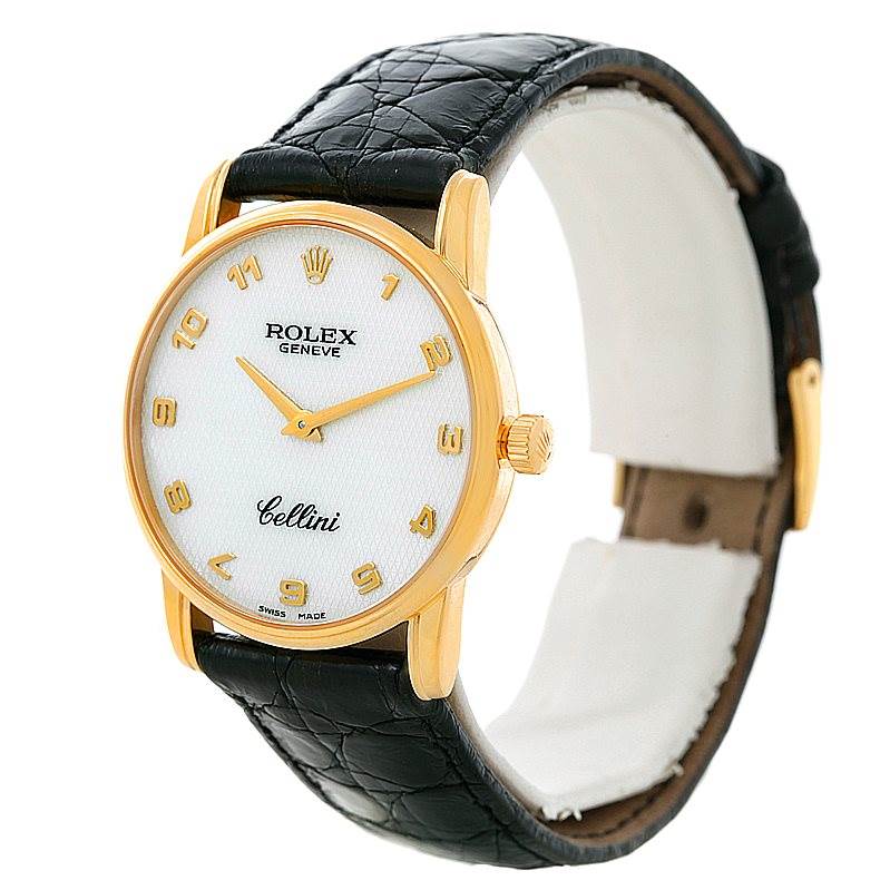 The Rolex Cellini 5116 Men's Yellow Gold Mother of Pearl Dial 5116 Men's Yellow Gold Mother of Pearl Dial watch is shown at a slight angle, displaying its white dial, gold case, and black leather strap.