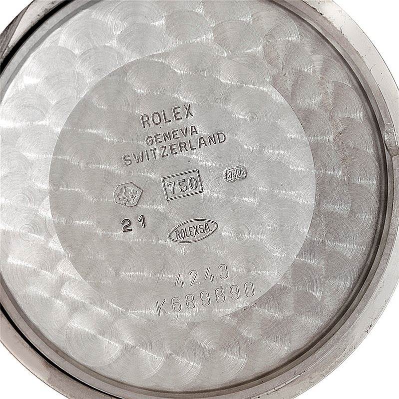 This image shows the inner case back of a Rolex Cellini 4243 Men's White Gold Black Dial 4243 Men's White Gold Black Dial watch, displaying various engraved markings and reference numbers.