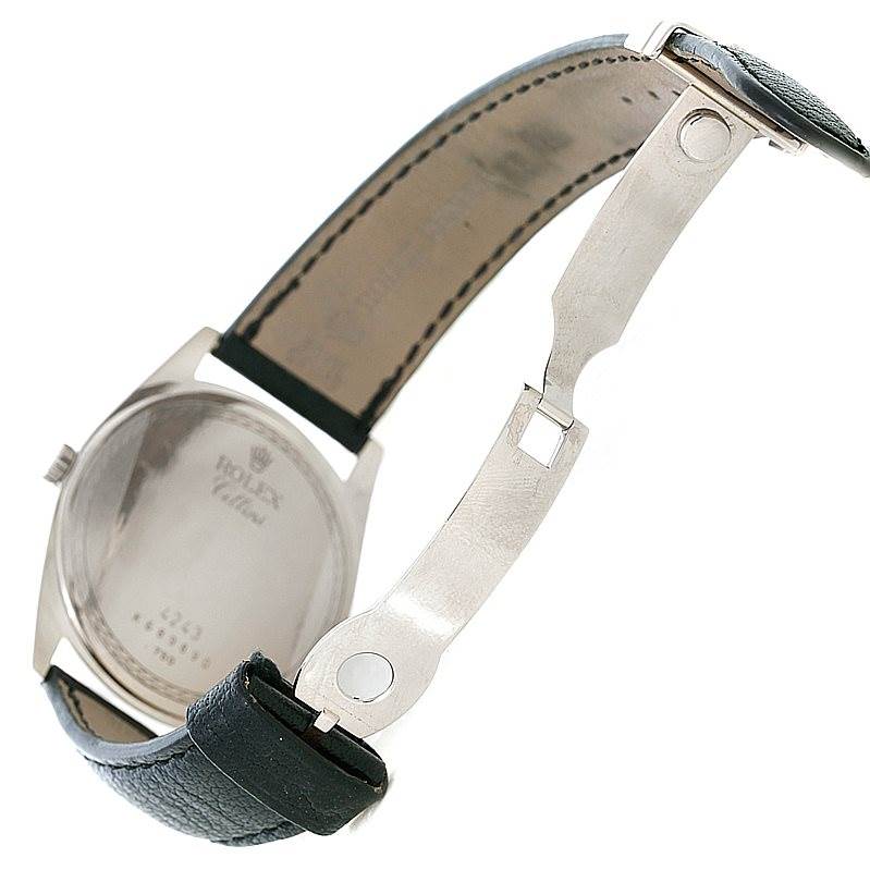 The image shows the back case and partially opened clasp of the Rolex Cellini 4243 Men's White Gold Black Dial 4243 Men's White Gold Black Dial watch.