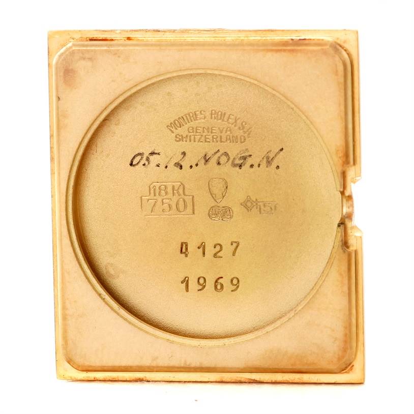 This image shows the inner case back of a Rolex Cellini 4127 Men
s Yellow Gold Champagne Dial 4127 Men
s Yellow Gold Champagne Dial watch, including markings and material details.