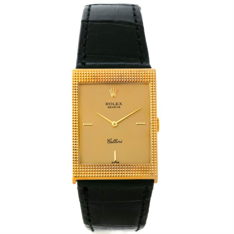 This image shows a front view of a Rolex Cellini 4127 Men
s Yellow Gold Champagne Dial 4127 Men
s Yellow Gold Champagne Dial watch, featuring its gold rectangular dial and black leather strap.