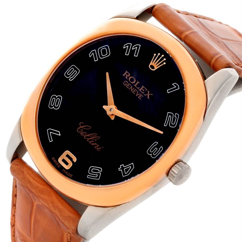 The Rolex Cellini 4233 Men's White Gold Black Dial 4233 Men's White Gold Black Dial watch is shown at an angle displaying the black dial, gold hands, crown, and brown leather strap.
