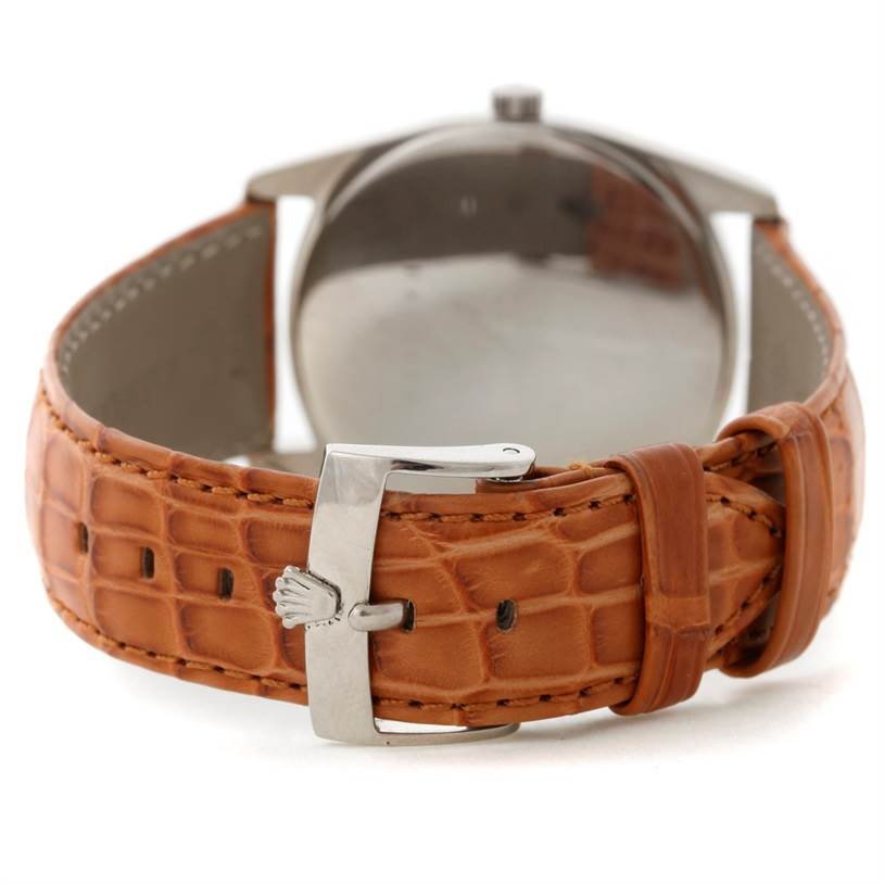 The image shows the back of a Rolex Cellini 4233 Men's White Gold Black Dial 4233 Men's White Gold Black Dial watch, highlighting the leather strap and metal clasp.